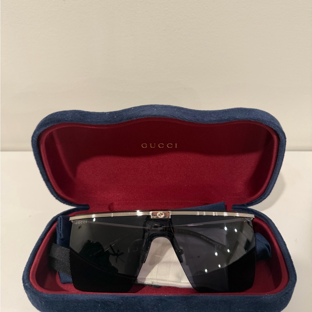 Gucci Black Shield Sunglasses with Gold Accents